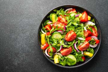 Fresh salad with leaves and vegetables.