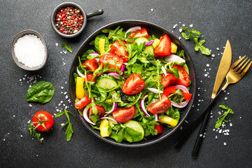 Fresh salad with leaves and vegetables.