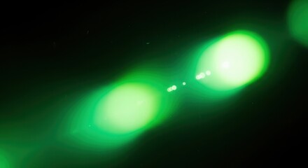Emerald and lime green light leaks on black background, glowing ethereal bokeh, misty halo effect, soft light diffusion, mysterious sci-fi aura, macro lens photography style 