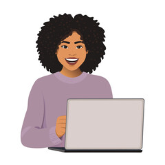 Smiling African woman with curly hair operates her laptop in a portrait