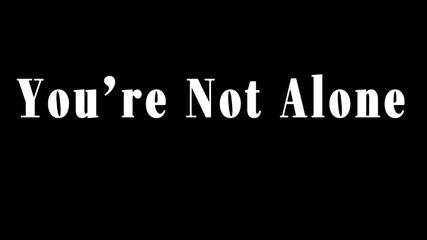 You're not alone text in white bold font on a black background offering support and encouragement message