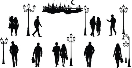 Silhouettes of people walking near lampposts and city skyline at night couple