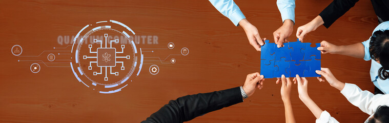 A diverse group of professionals collaboratively working on quantum computing concepts, showcasing...