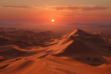 Fototapeta premium Mesmerizing view of expansive sand dunes enveloped in golden sunlight at dusk offering an evocative blend of tranquility and vastness inspiring exploration and adventure