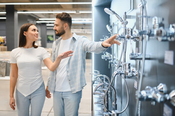 Couple shopping bathroom fixtures for home renovation