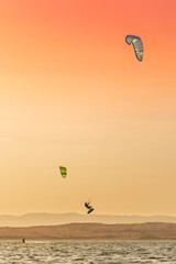 Kite surfing on the beach sunset at Paracas reservation