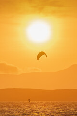 kite surfing in the sea in Paracas, Peru warm summer, clean ocean, sustainable sport