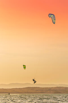 Kite surfing on the beach sunset at Paracas reservation