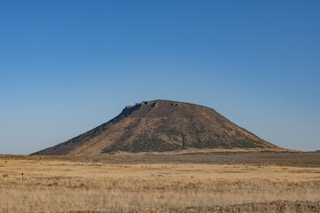 Middle Butte is a cryptodome composed of basalt. Three Buttes Historical Marker. Volcanic Field. Idaho's eastern Snake River Plain. 