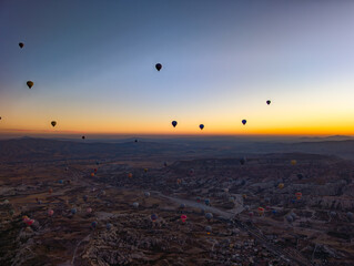 Balloons in Cappadocia at sunrise