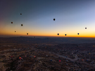 Balloons in Cappadocia at sunrise