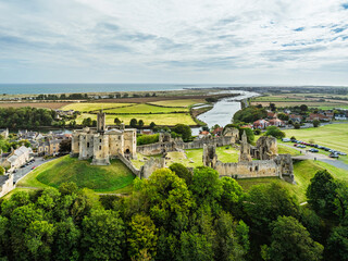 Warkworth Castle over River Coquet from a drone, Warkworth, Northumberland, England