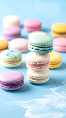 Obraz premium Colorful macarons stacked on a light blue background