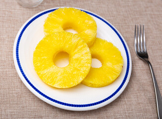 Beautifully sliced pineapple on white plate, beautiful serving pineapple on festive table