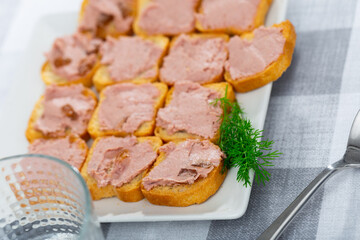 Delicious toasts with pollock liver pate - light snack before lunch
