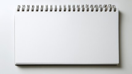a spiral bound notebook with three lined pages, each divided by a paperclip into four sections. it is placed against a light background