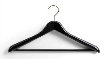 a black coat rack hangs with a wooden hanger against a neutral background