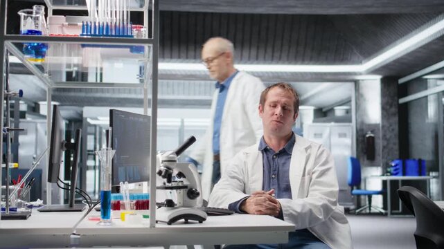 POV of lab scientist on video conference call explaining molecular analysis and biotechnology study results. Web connection supports telehealth, medical discovery and innovation. Camera A.