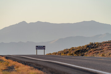 U.S. Highway 26 (US 26) , near Atomic City, Idaho. Snake River Plain.  Lost River Range. 