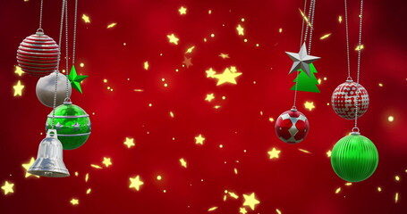 Fototapeta premium Image of christmas baubles decoration and stars on red background