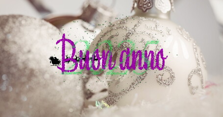 Image of santa in sleigh over christmas baubles and buon anno text with 2025 year
