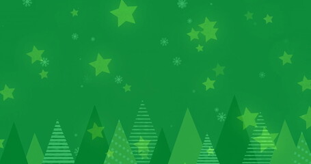 Fototapeta premium Image of stars and snow falling over fir trees on green background
