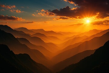 Panoramic mountain range at sunset with glowing clouds layered silhouettes and dramatic alpine grandeur inspiring travel and outdoor wonder