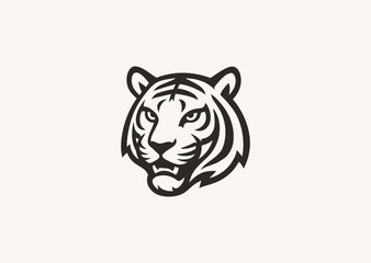 A silhouette style logo of a tiger head, symbolizing courage, focus, and raw power