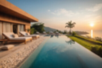 Fototapeta premium Blurred background of a modern swimming pool with lounge chairs beside it for visitors to relax, with a charming sunset.