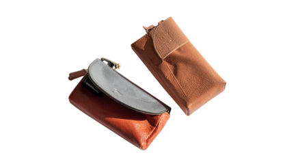 Two cosmetic pouch mockup variations isolated on transparent background