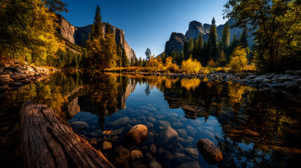 Yosemite valleys serene reflection in the merced river during a vibrant autumn day