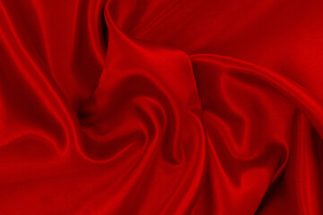 Dark red fabric texture background, detail of silk or linen pattern.