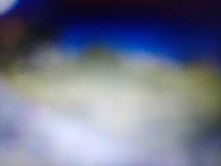 A softly blended gradient showcases a tranquil spectrum of ethereal colors creating a serene and atmospheric visual experience.