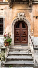 Ornate wooden door on a weathered stone stoop