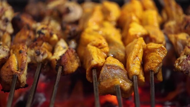 Closeup shot of cooking chicken tikka. Delicious Smoked chicken.