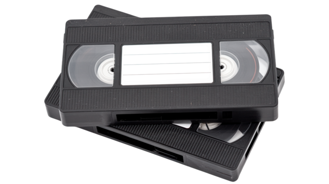 Stack of vintage vhs video cassettes isolated  representing retro media and old technology