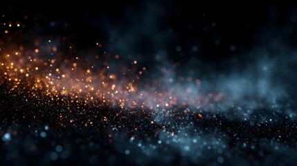 Abstract stream of glowing orange and blue particles drifting through a dark misty atmosphere with soft bokeh effects