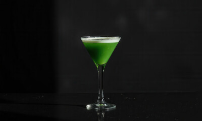 Nocturnal Contemplation: An Emerald Green Martini Glass of Boba Tea