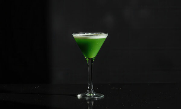 Nocturnal Contemplation: An Emerald Green Martini Glass of Boba Tea