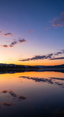 Serene Sunset Over Still Water.