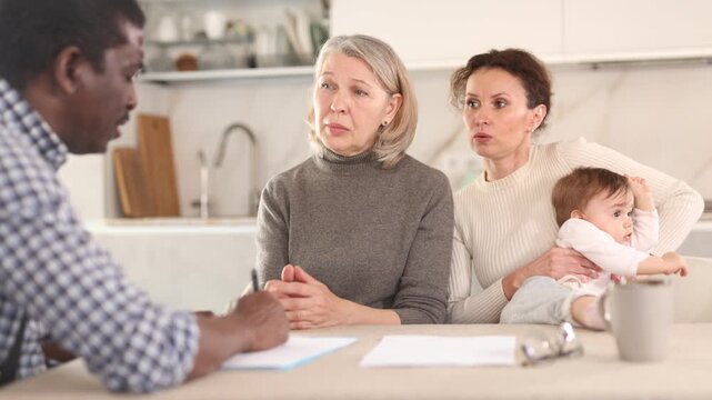 Experienced male agent offers good insurance conditions for family of different generation. High quality 4k footage