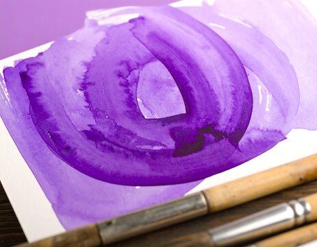 Purple abstract watercolor with circular swirl on