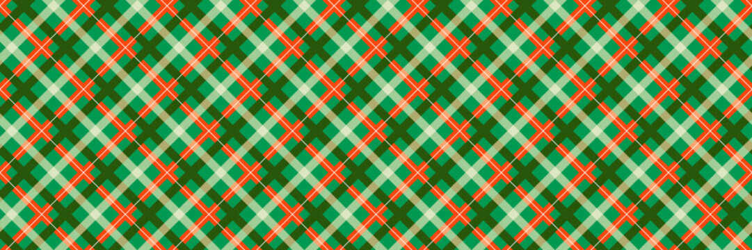 Christmas seamless pattern. Red and green checkered gingham background. New year tartan texture for wrapping paper, present box decoration, fabric, textile swatch. Vichy plaid check backdrop. Vector 