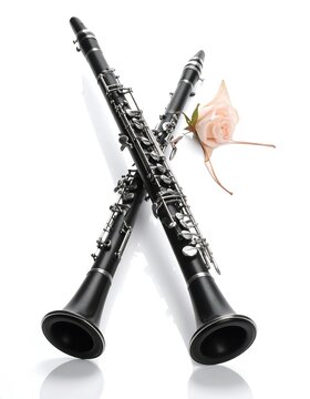 Two crossed clarinets with rose