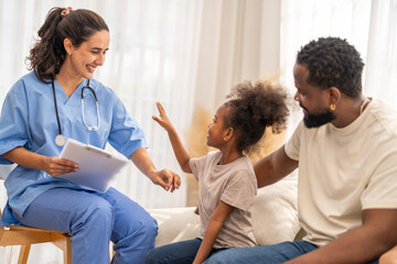 Doctor use tablet for medical checkup consulting african child about health while father sits beside, concept of pediatric healthcare, digital diagnosis, telemedicine, patient care and family support
