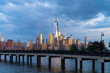 Naklejka premium New York City on sky clouds. NYC cityscape with skyscrapers. Panoramic of New York City skyline. Manhattan skyline. New York and Hudson River. Downtown NYC. New York skyscrapers.