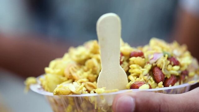 Spicy Indian snack Bhel puri. Quick Indian street food.