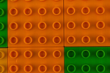 Fototapeta premium Colorful building blocks arranged in a playful pattern on a surface