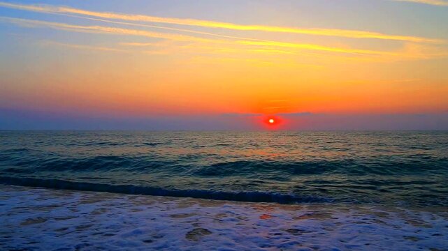 Beautiful summer sunrise over the beach
