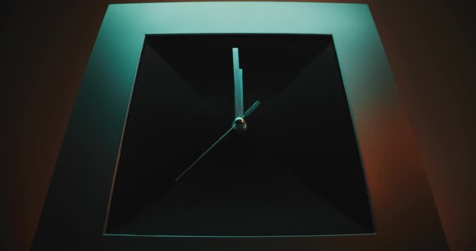 Time Lapse: Close Up of Minimalist Square Wall Clock on Pink Background with Moving Clock Hands Showing Precise Time. Contemporary Design Element of Interior. Concept of Punctuality, Time Management.